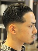 漢のスキンフェードカットオールバックスタイル