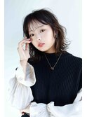 オリーブの透明感とナチュラルウエーブが好印象