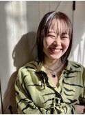 大人可愛い小顔丸み前下がりボブ