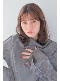 フェミニンセミロングゆるふわカール眉上薄めバング