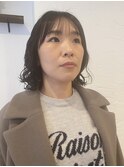 コテで巻いたような外はねボブパーマ