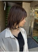 パーマを生かしたミディアムボブ