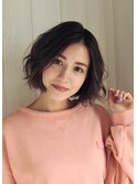 丸みシルエットのふんわりパーマボブ