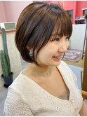 柔らか質感のシースルーマロンベージュ×丸みショートボブ