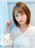 ひし形シルエットのミディアムスタイル
