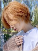 大人可愛らしさが出るアプリコットカラーウェーブウルフカット