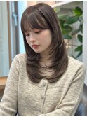 小顔韓国ヘアレイヤーカット前髪あり暗髪ダークグレージュカラー