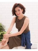 ウェットな質感に毛先が遊ぶ、かき上げボブ