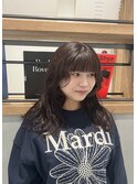 コテで巻いたように見えるパーマスタイル