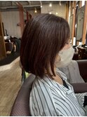 ツヤと透明感を叶える、暖色系の赤みブラウン×愛されボブ