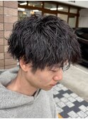 伸ばしかけの波巻きパーマ