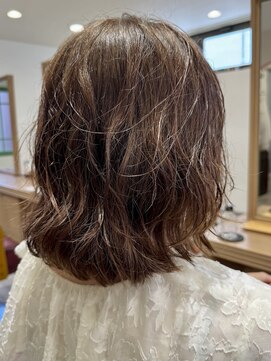 スーパーロングからクセを生かしたショートスタイル