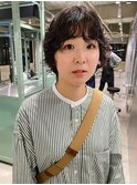長めのショートとパーマヘア