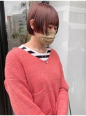 ピンクカラーのステップカットボブ/落合