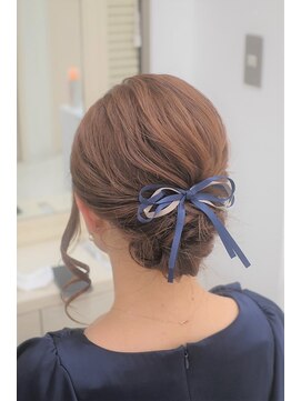 リサ 恵比寿(risa.) 太めねじりの入ったシニヨンスタイル