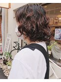 お洒落にクルっとパーマ