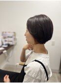 オレンジイヤリングカラーのショートボブ