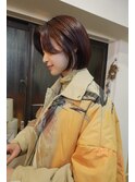 流れる顔まわりに葡萄色