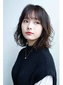 前髪は流して華やかに甘さを残したひし形シルエットパーマ