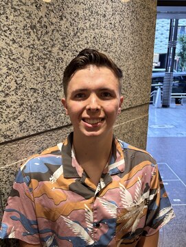 ヘアモード キクチ 銀座店 Clean side part with a low skin fade.