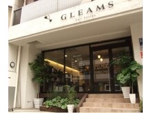 グリームス ヘアデザイン(GLEAMS Hair Design)の雰囲気（目印は白い壁と緑がいっぱいの外観）