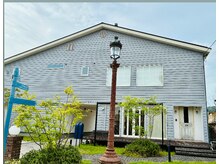 ソッリーソ(Sorriso.)の雰囲気（右の白いドアからご来店ください♪）