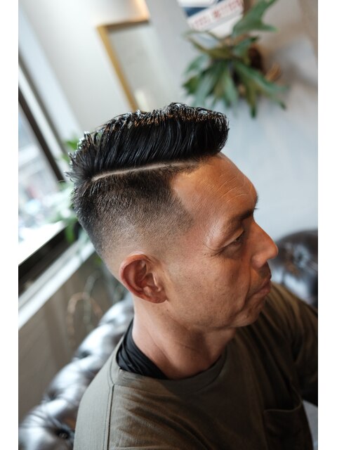 Hard parted Skin fade