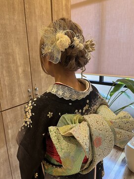 ラプチャー(RAPTURE) 飾りがいきるシニヨンスタイル