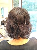 ミディアムレイヤーの、パーマスタイル