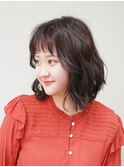 ゆるいパーマを活かして＿ボブのスタイリングをフェミニンに◎