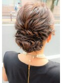 ロープ編みのシニヨンスタイル