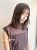 ストレート内巻きレイヤーボブ　アッシュブラウン顔まわりカット