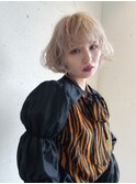 curly blond bob