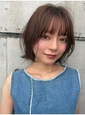 柔らかな丸みとくびれの外ハネレイヤースタイル