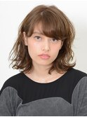 無造作ウェーブがおしゃれな伸ばしかけボブ