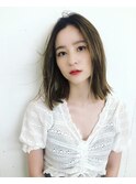 ニュアンスパーマで洗練された重軽ボブ