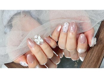 春らしくピンクと乳白のストン。