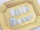 ネイルクリニック(NAIL CLINIC)の写真/ケア専門店ならではのこだわりの技術と仕上がりの美しさ。季節に合わせフットネイルで洗練された足元へ。