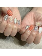 エム(em)/オレンジネイル