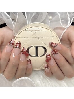 チェック×赤ネイル