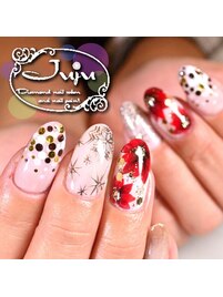 赤いポインセチアネイル