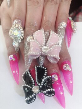 ネイルサロン ティプレシャス(T Precious)/大きいリボンのキラキラネイル♪