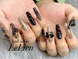 gold × black