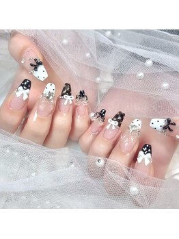 ミオ(mio)/ドット×チェック×リボンネイル