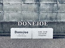 ダンジョウ(DoneJoe)の雰囲気(建物左から裏に回り、店名の入ったブロックがある所が駐車場です)