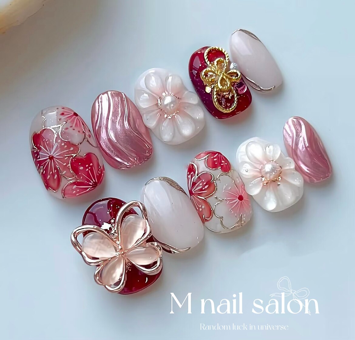 2025年-2026年冬トレンド】ピンク フラワーのネイルデザイン集｜人気順