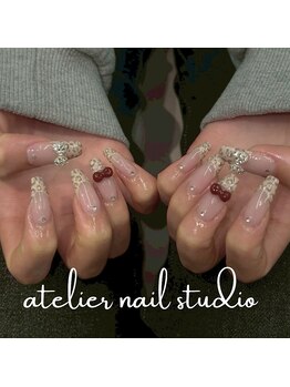 アトリエネイルスタジオ(atelier nail studio)/上品ベージュ×リボンネイル