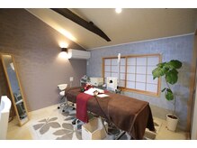 ポーラ ウィンハート店(POLA Win-heart)/エステベッドへご案内