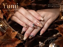 秋色チェックで魅せる上品ネイル