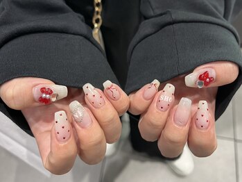 サクノネイル(SAKUNONAIL)/レッドリボンガーリーネイル